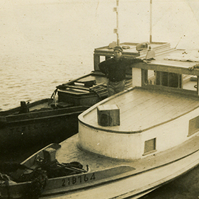 A black and white picture of two of Devall's first tow boats purchased in 1952